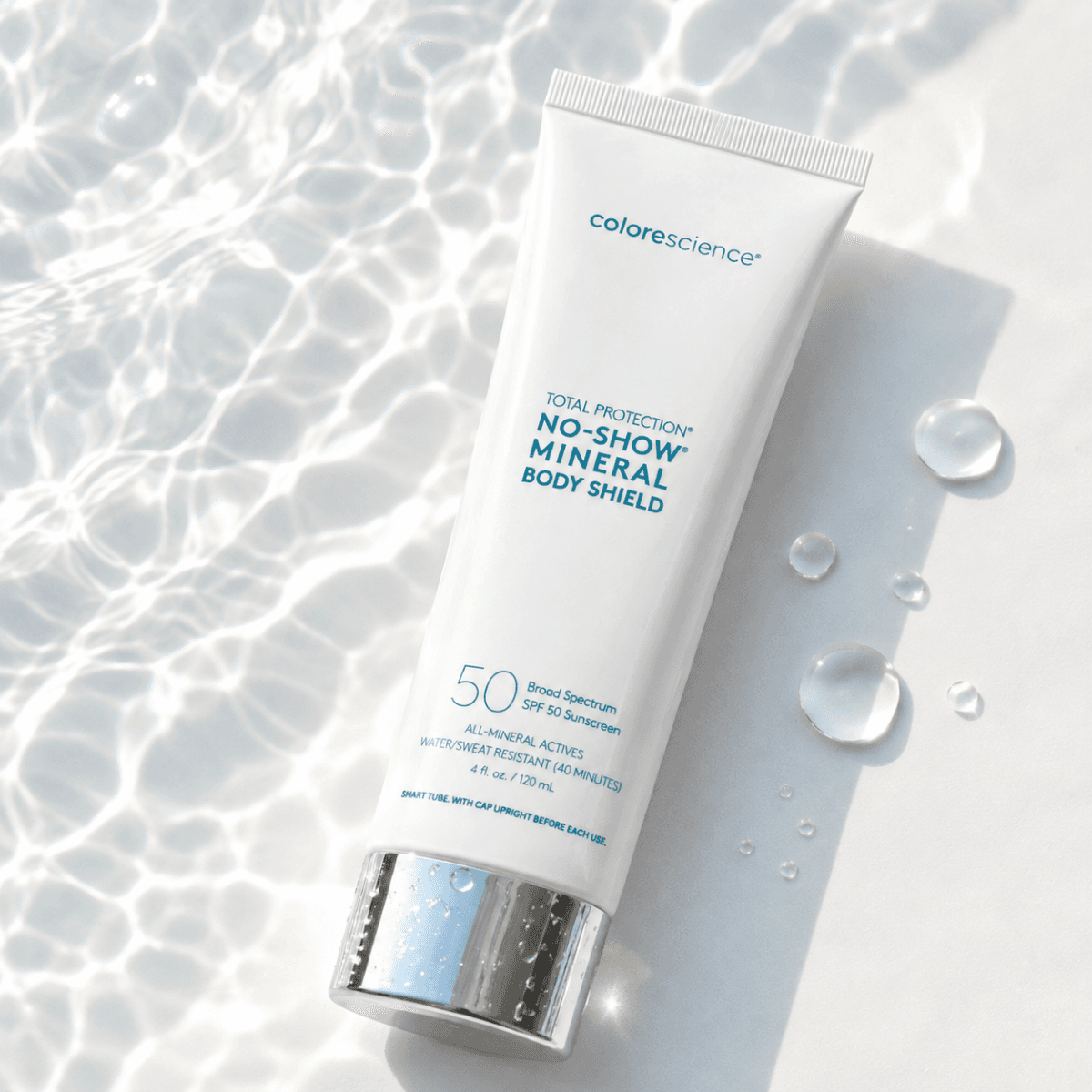 Прозорий мінеральний сонцезахисний флюїд для тіла Colorescience Sunforgettable Total ProtectionTM No-Show Body Shield SPF 50, 140 мл Прозорий мінеральний сонцезахисний флюїд для тіла Colorescience Sunforgettable Total ProtectionTM No-Show Body Shield SPF 50, 140 мл